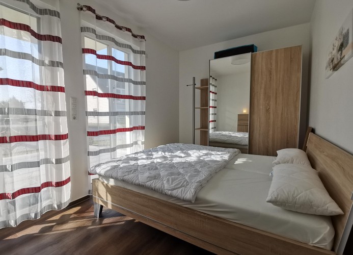 Schlafzimmer 1 mit Doppelbett im Erdgeschoss